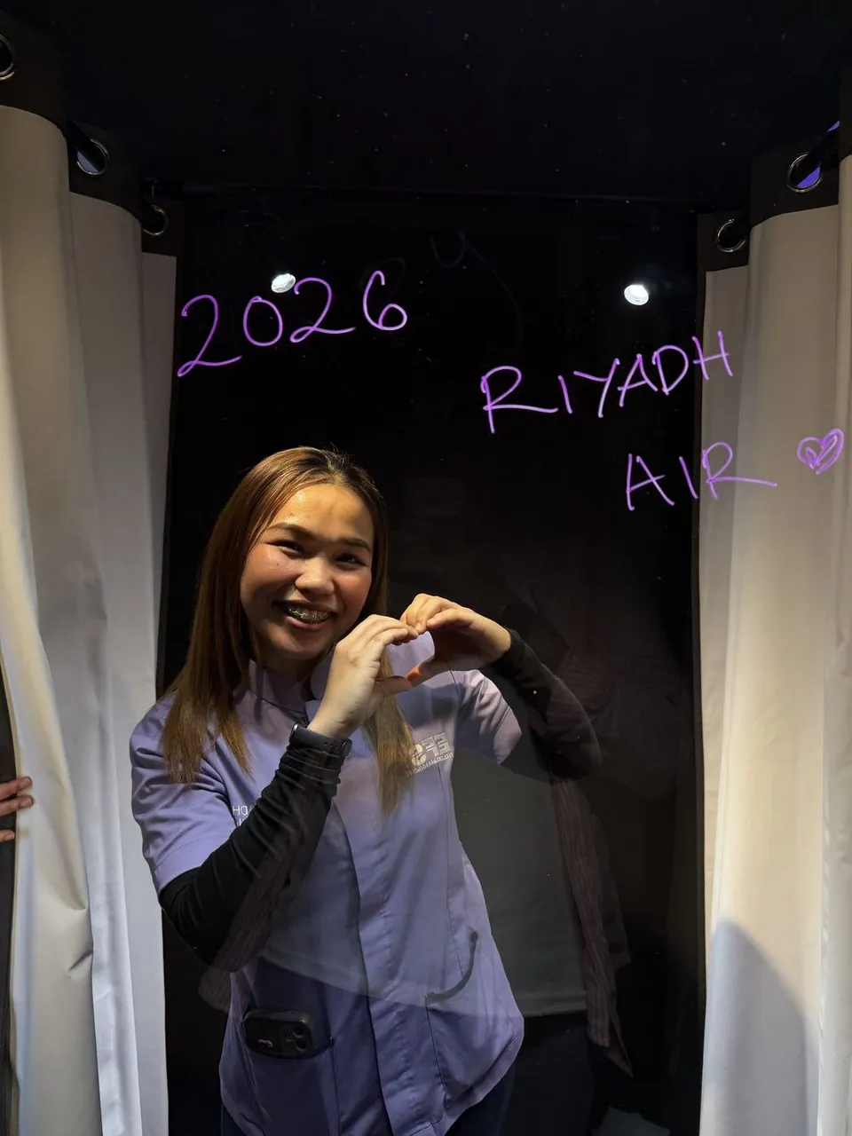 Riyadh Air 2026 message written on the Signature Booth glass