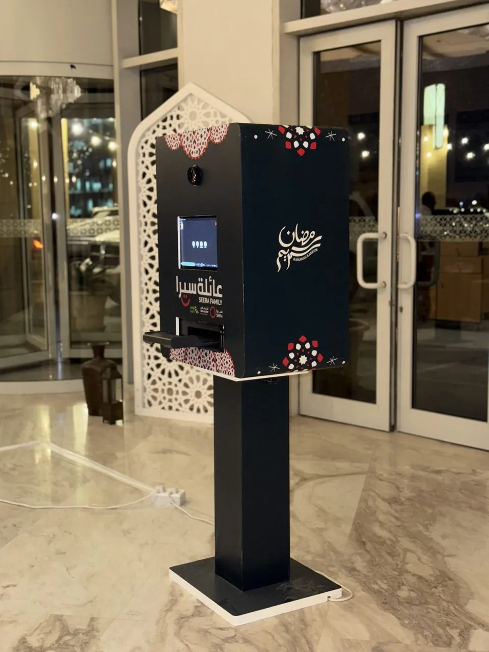 Ramadan-wrapped New Classic booth at the Seera family iftar entrance
