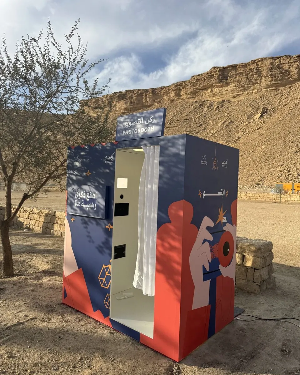 Vintage curtain booth at a desert event